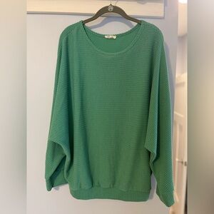 Raglan sleeve green top. Runs oversized. Size Medium but fits like XL.